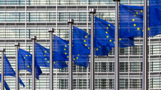 Row of EU Flags in front of the European Union Commission building in Brussels